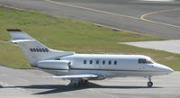 N886QS @ TNCM - N886QS taxing to bravo after making the wrong turn on the main ramp. they get a next chance