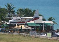 VP-AAJ @ TNCM - VP-AAJ over the tresh hold for runway 10 tncm