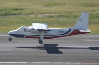 VP-AAJ @ TNCM - Landing on runway 10 VP-AAJ
