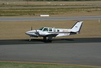 VH-SQF @ YPJT - VH-SQF Baron of the Singapore training fleet at Jandakot, WA - by Pete Hughes