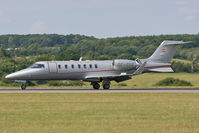 OE-GVA @ EGGW - Runway 26 arrival. - by MikeP