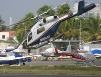 N904AF @ TNCM - N904AF departing the helipad to St Barths - by SHEEP GANG