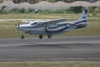 N409MN @ TNCM - N409MN Landing at TNCM - by SHEEP GANG