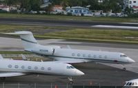 N550SN @ TNCM - N550SN Park at the Cargo ramp - by SHEEP GANG