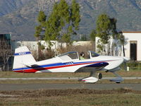 N96EV @ POC - Taxiing to runway 26L only to cross to runway 26R for take off - by Helicopterfriend
