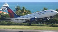 N303DQ @ TNCM - Delta airlines departing TNCM runway 28