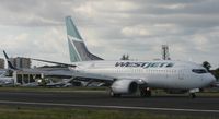 C-FWAO @ TNCM - Westjet C-FWAO landing at TNCM