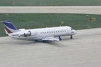 N412SW @ KPIA - Sky West (N412SW) taxiies for departure - by Thomas D Dittmer