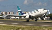 C-FIWJ @ TNCM - Westjet C-FIWJ departing TNCM runway 10