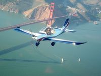 N412EV - N412EV over the San Francisco Bay, Jan 17 2009 - by Phil Haupt