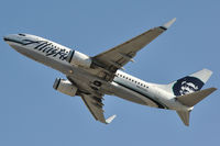 N622AS @ SNA - Rare departure on runway 1L during Santa Ana winds - by Bob Grandolfo