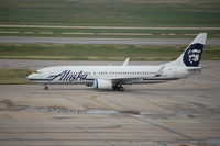 N597AS @ IAH - N597AS, the lone ASA arrival from SEA, taxiing to parking on txy NB - by AJ Heiser