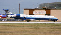 N159GJ @ KAUS - GJS/UALX taxis to 17L. - by Darryl Roach