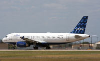 N561JB @ KAUS - JBU rolls on 17L. - by Darryl Roach