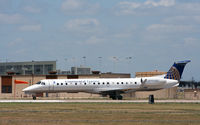 N14180 @ KAUS - BTA/COAX rolls on 17L. - by Darryl Roach