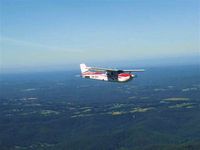 VH-IDV @ YSBK - In Flight - by Gary Carter