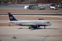N818AW @ PHX - N818AW taxiing down Charlie - by AJ Heiser
