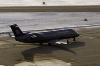 N927SW @ KPIA - United Express (N927SW) short of taxiway Tango - by Thomas D Dittmer