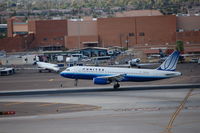 N402UA @ PHX - N402UA takeoff rwy 26 - by AJ Heiser