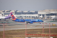 N805SY @ LAX - N805SY lining up for takeoff rwy 24L - by AJ Heiser