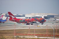 VH-OEJ @ LAX - Lining up for takeoff rwy 24L - by AJ Heiser