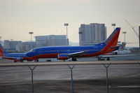 N312SW @ LAS - Positioning rwy 25R - by AJ Heiser