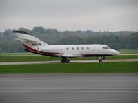 N1897S @ KLUK - Red-white-and-blue Falcon - by Kevin Kuhn