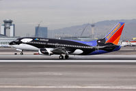 N334SW @ LAS - Southwest Airlines Shamu N334SW (FLT SWA5685) from San Diego Int'l (KSAN) landing RWY 25L.