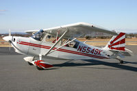 N5549K @ KEHO - Sitting pretty in the rays of sunlight. - by Jamin