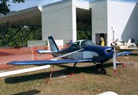 N77JA @ KLAL - Stits (Archibald) SA-11-A Playmate outside the ISAM (International Sport Aviation Museum) during Sun 'n Fun 2000, Lakeland FL