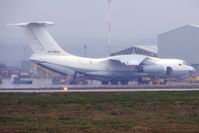 EW-78843 @ EGNX - A rather murky image of Trans Avia Export Cargo's IL-76 being loaded in pouring rain at EMA with supplies for the Haiti Relief effort - by Terry Fletcher