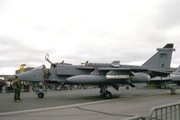XX720 @ EGXW - Sepecat Jaguar GR1A at RAF Waddington's Air Show in 1995. - by Malcolm Clarke
