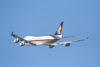 9V-SFQ @ KLAX - Singapore Boeing 747-412F,  25L departure KLAX. - by Mark Kalfas