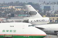 B-16482 @ KLAX - Eva AIR CARGO Boeing 747-45EF, on the cargo ramp next to World N303WL KLAX. - by Mark Kalfas