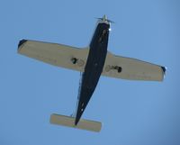 N269Z @ KISZ - Passing over the ramp area before landing