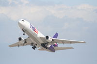 N571FE @ KLAX - FedEX MD-10-10, 25L departure KLAX. - by Mark Kalfas