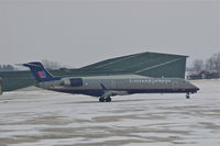 N506MJ @ CID - Moving into position for de-icing during light snow