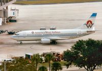 N306AW @ TPA - Boeing 737-3G7 of America West Airlines at Tampa in November 1993. - by Peter Nicholson