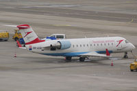 OE-LCQ @ VIE - Austrian arrows Canadair Regional Jet CRJ200LR - by Joker767