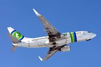 PH-XRX @ LOWS - Transavia Airlines Boeing B737-7K2 after take off - by Janos Palvoelgyi