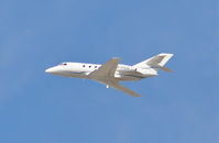 N720JC @ KLAX - MINNESOTA CHOICE AVIATION V FALCON 20-F5, 25R deprture KLAX. - by Mark Kalfas