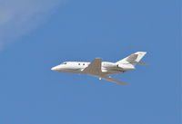 N720JC @ KLAX - MINNESOTA CHOICE AVIATION V FALCON 20-F5, 25R deprture KLAX. - by Mark Kalfas
