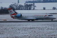 OE-LCM @ VIE - Austrian arrows CRJ - by Chris J