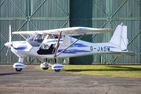 G-JADW @ EGBO - Part of a busy aviation scene at Wolverhampton (Halfpenny Green) Airport on a crisp winters day - by Terry Fletcher