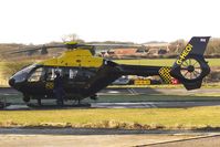 G-HEOI @ EGBO - Part of a busy aviation scene at Wolverhampton (Halfpenny Green) Airport on a crisp winters day - by Terry Fletcher