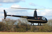 G-DMRA @ EGBO - Part of a busy aviation scene at Wolverhampton (Halfpenny Green) Airport on a crisp winters day