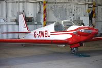 G-AWEL @ EGBO - Part of a busy aviation scene at Wolverhampton (Halfpenny Green) Airport on a crisp winters day - by Terry Fletcher