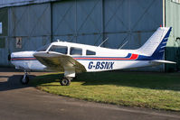 G-BSNX @ EGBO - Outside the maintenance hangar. - by MikeP