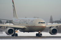 A6-EYI @ EGCC - Etihad Airways - by Chris Hall