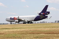 N599FE @ LFPG - on landing at CDG - by juju777